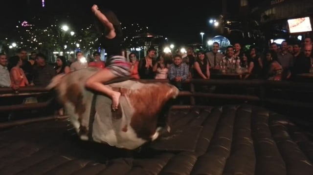 Sexy mechanical bull riding