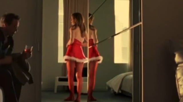 Michelle Monaghan strips out of her little Santa dress in Kiss Kiss Bang Bang. 2005